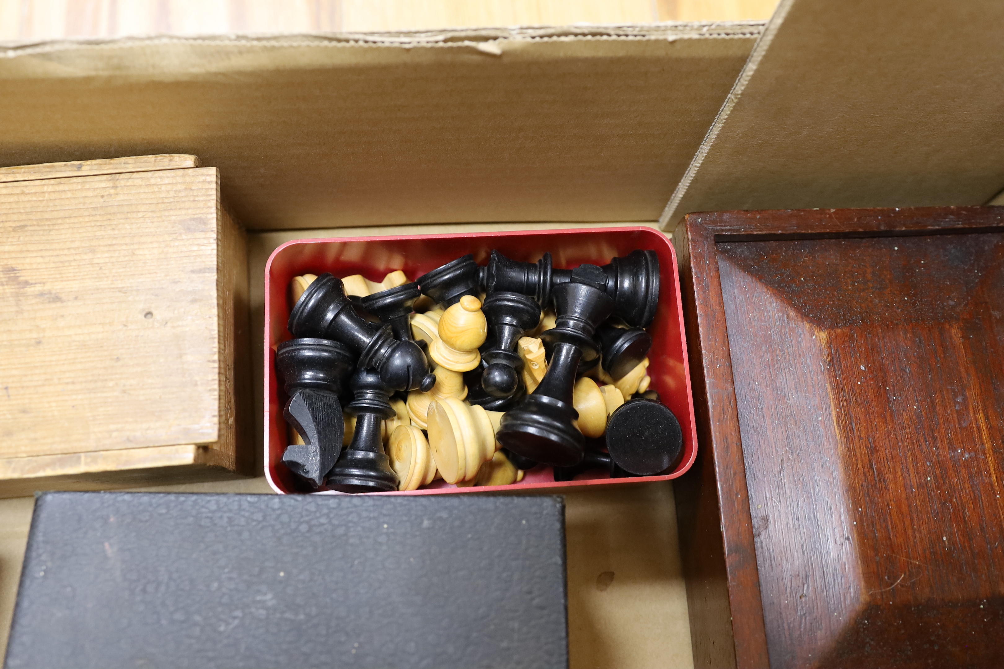 A collection of chess sets (six boxed) and one set of draughts, two boxes marked Jaques